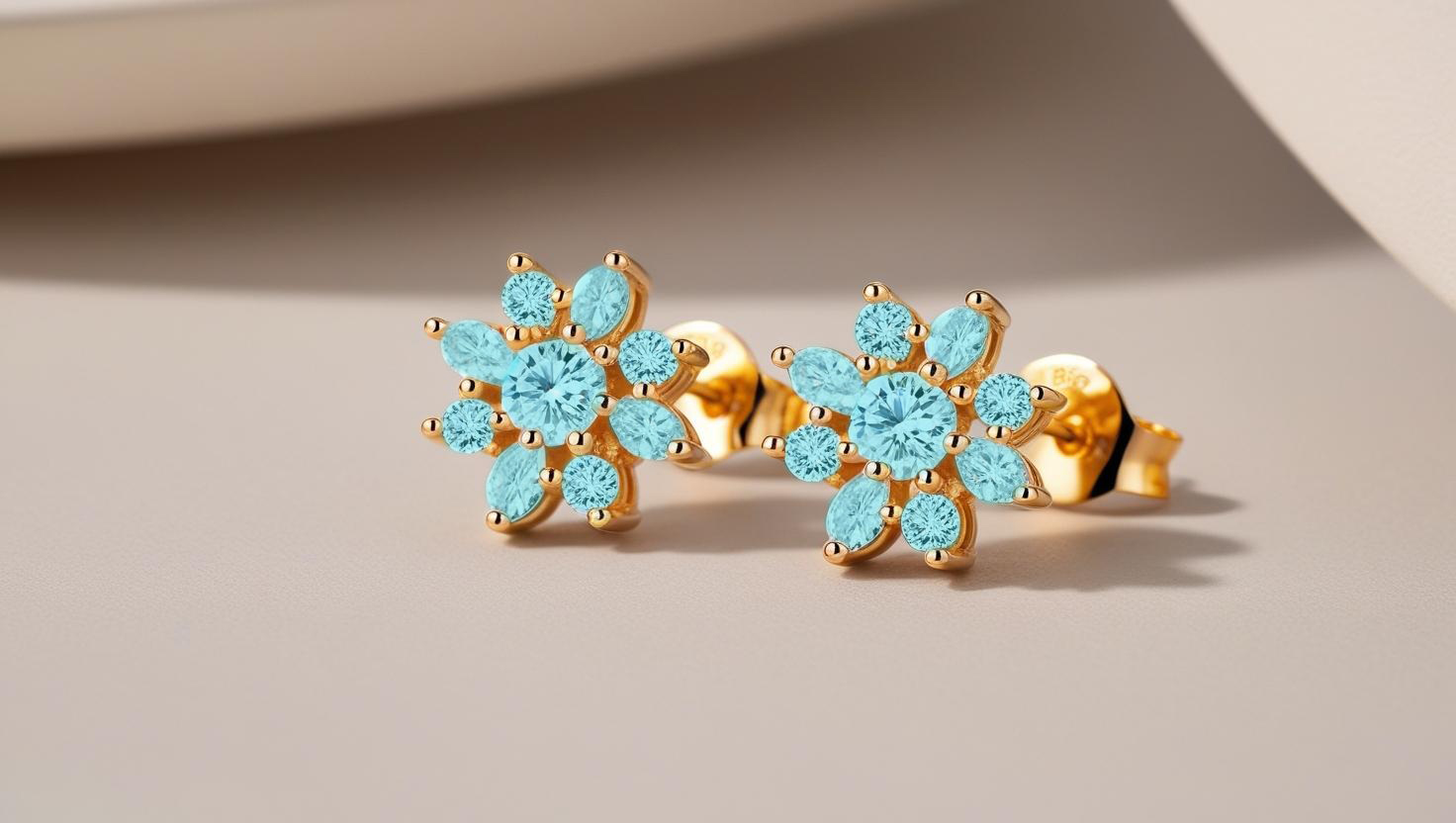 Ohrringe gold mit blauem stein